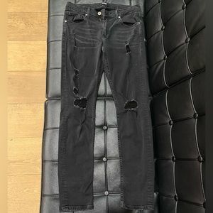 Men’s black denim Paige jeans.